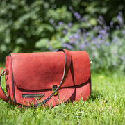 Red handbag over the shoulder
